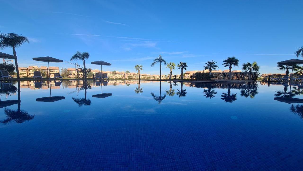 Mini-Villa Situee Dans Une Residence Prestigia A Marrakech, Avec Une Vue Sur La Piscine Et Le Golf Une Securite 24H Sur 24 Et Une Proximite Ideale De L Aeroport 5 Minutes C Est Une Offre Parfaite Pour Des Vacances مراكش المظهر الخارجي الصورة